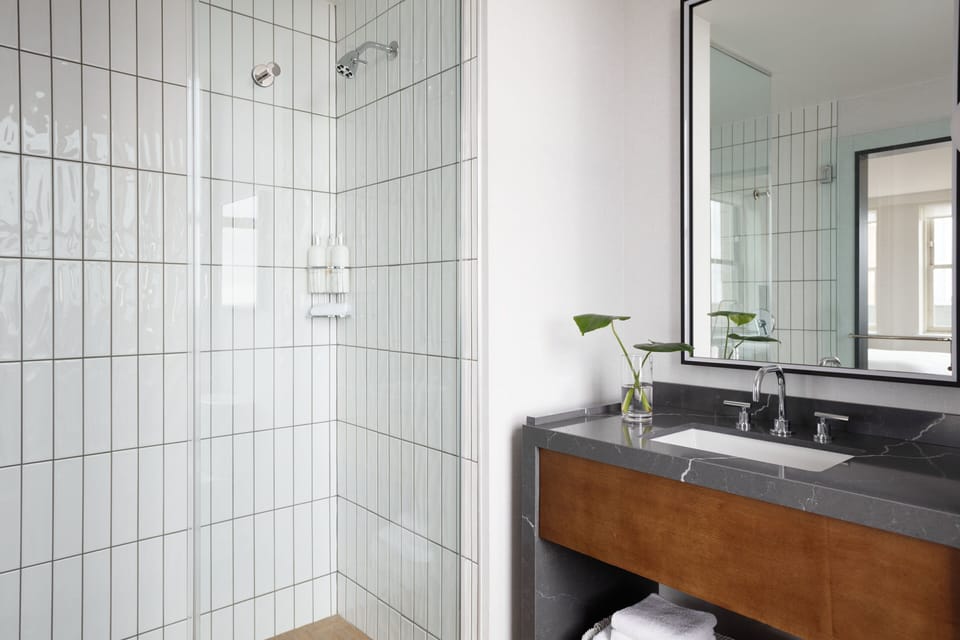 Start your morning at the polished vanity with bright mirror light.