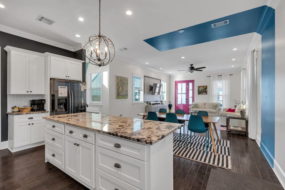 Open concept kitchen/dining/living room area