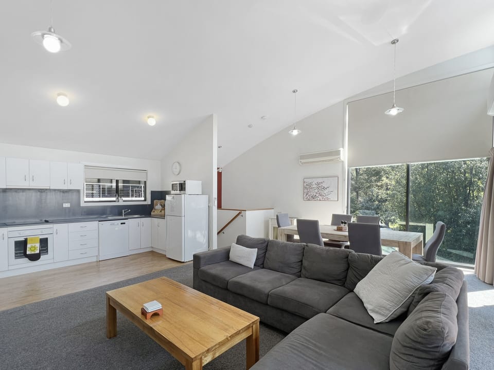 Spacious living room, fully equipped kitchen. Ideal for gatherings and cozy nights.