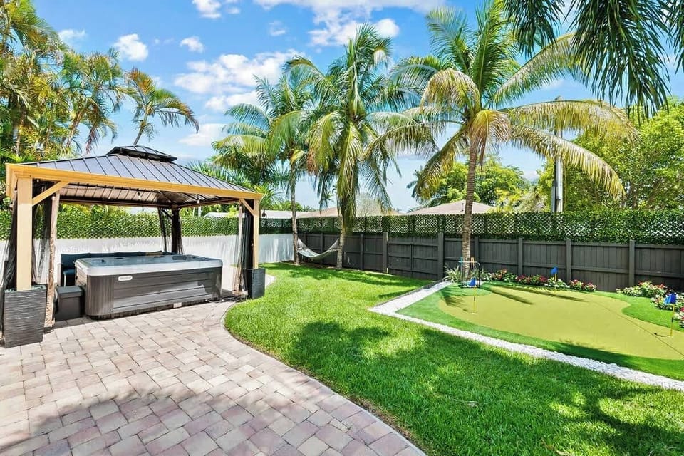 Spacious backyard with beautiful green layout