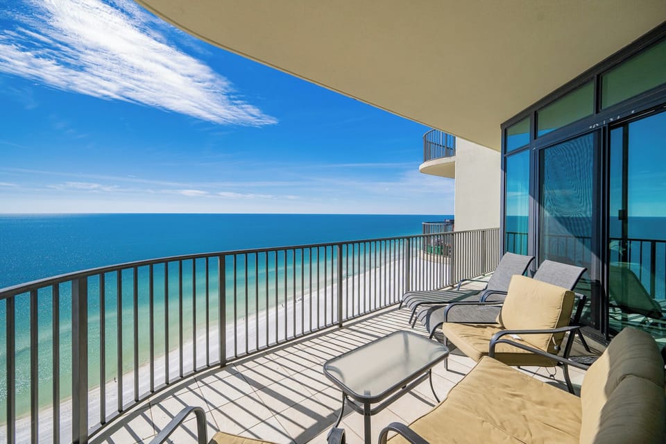 Relax in your comfy chairs on your balcony, taking in the stunning views and gentle sounds of the coast