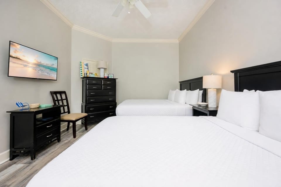 Unwind in this queen guest suite and stream your favorite shows or enjoy a good movie after a beach day