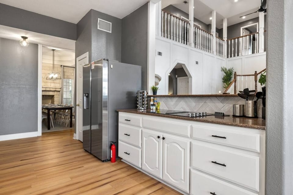 A double french door fridge provides plenty of space. Take advantage of the ice maker and blender to enjoy a margarita as you cook away on the 4-burner electric stovetop