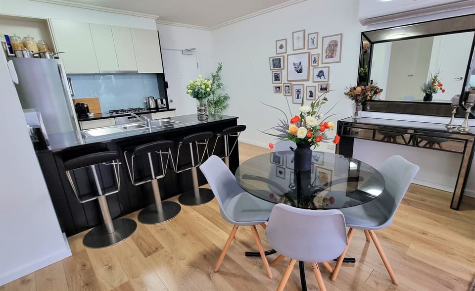 Glass top dining with seating for four