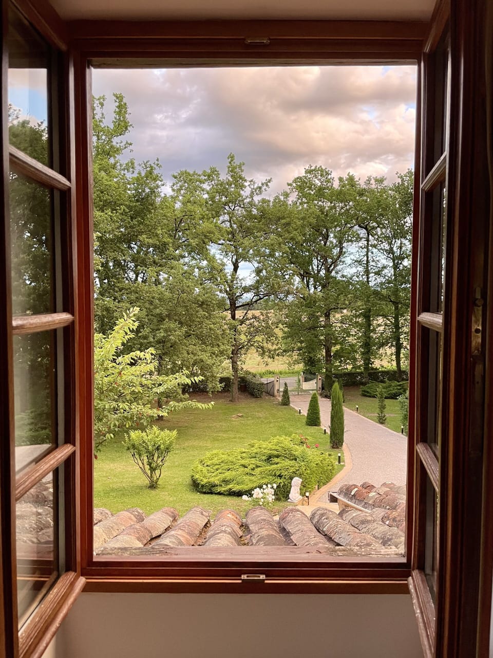 Open window view across the expansive private garden