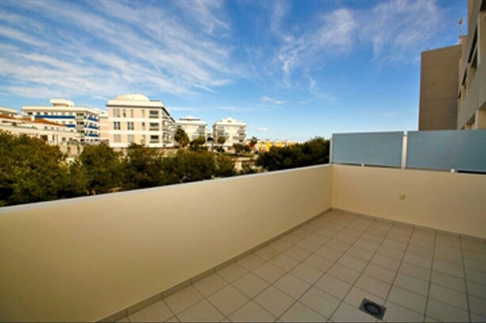 Back huge balcony to sunbathe and BBQ