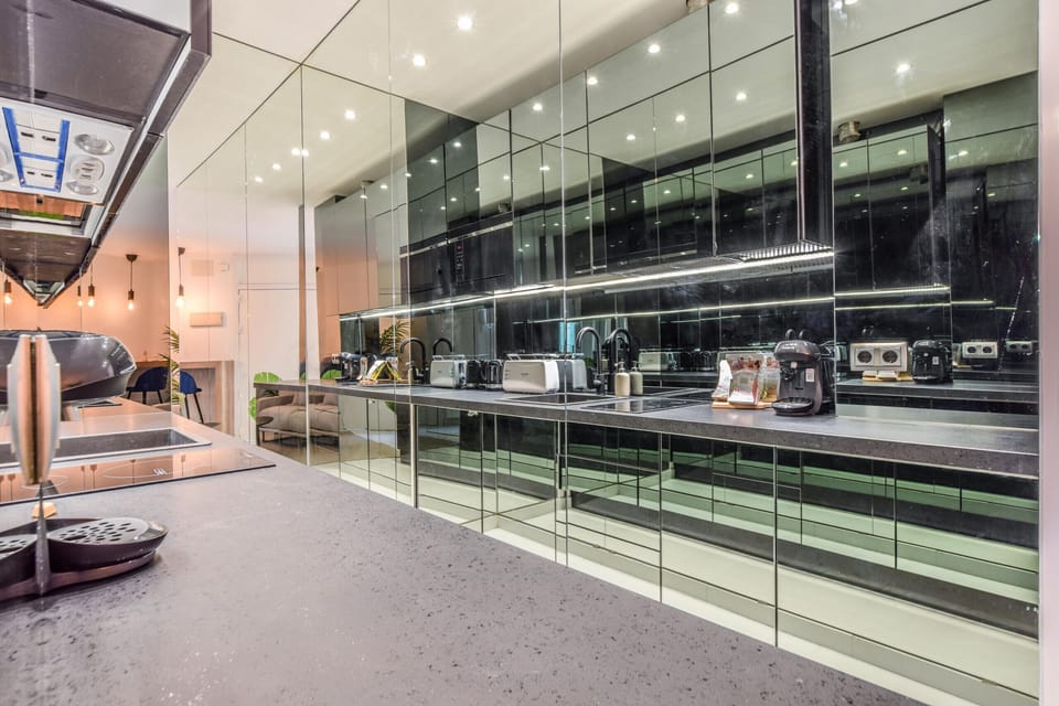 Main view of the kitchen space with appliances