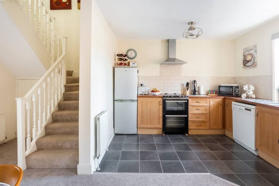 Kitchen and stairs to the bedrooms