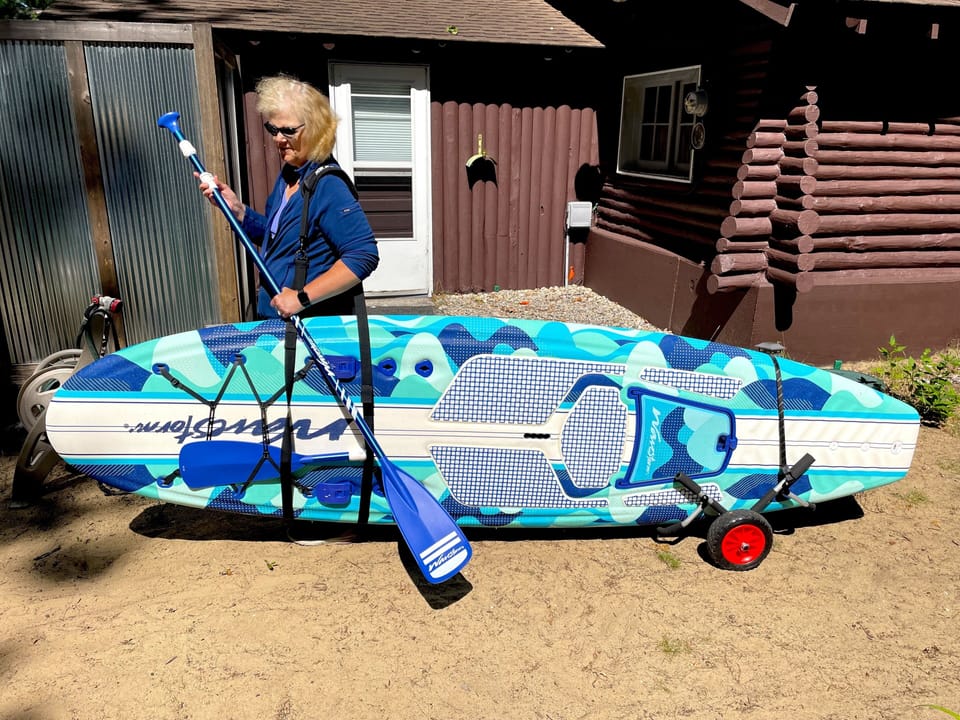Standup paddleboard, kayak, water toys & carts are provided for easy transport