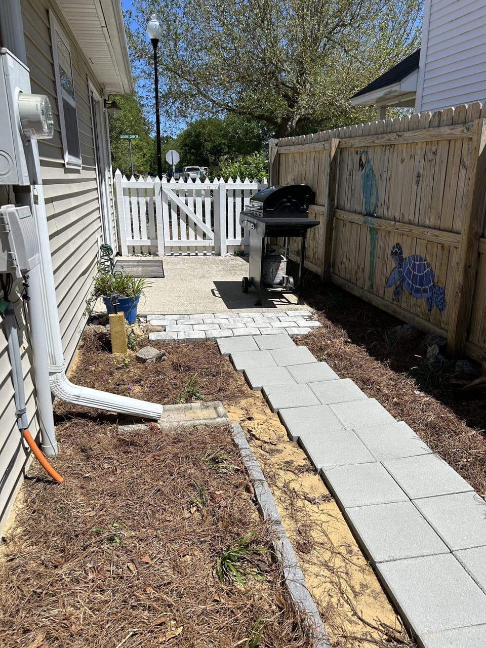 Side yard with propane grill