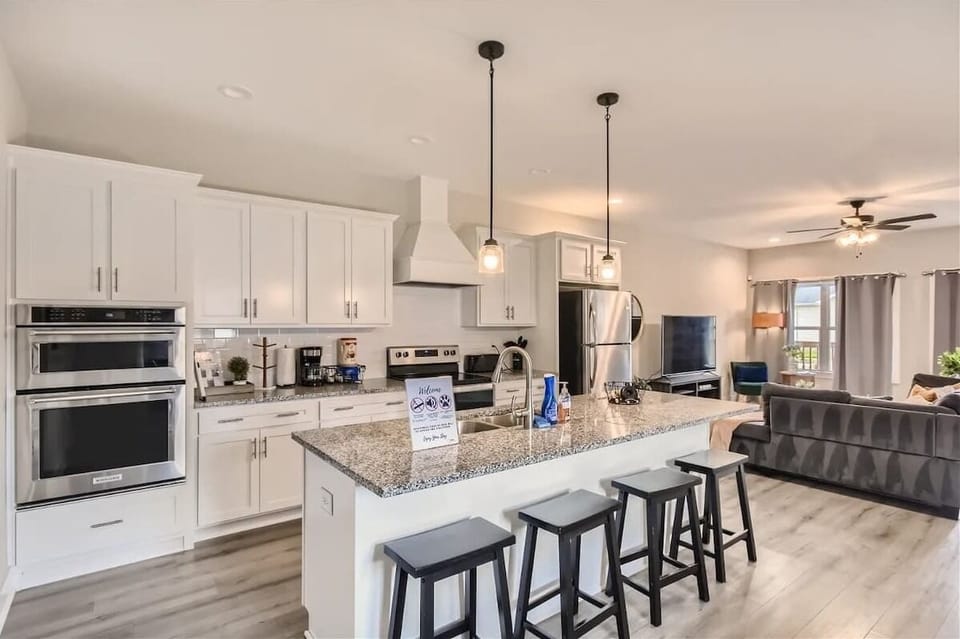 Cooking up love and laughter in this beautifully designed kitchen.