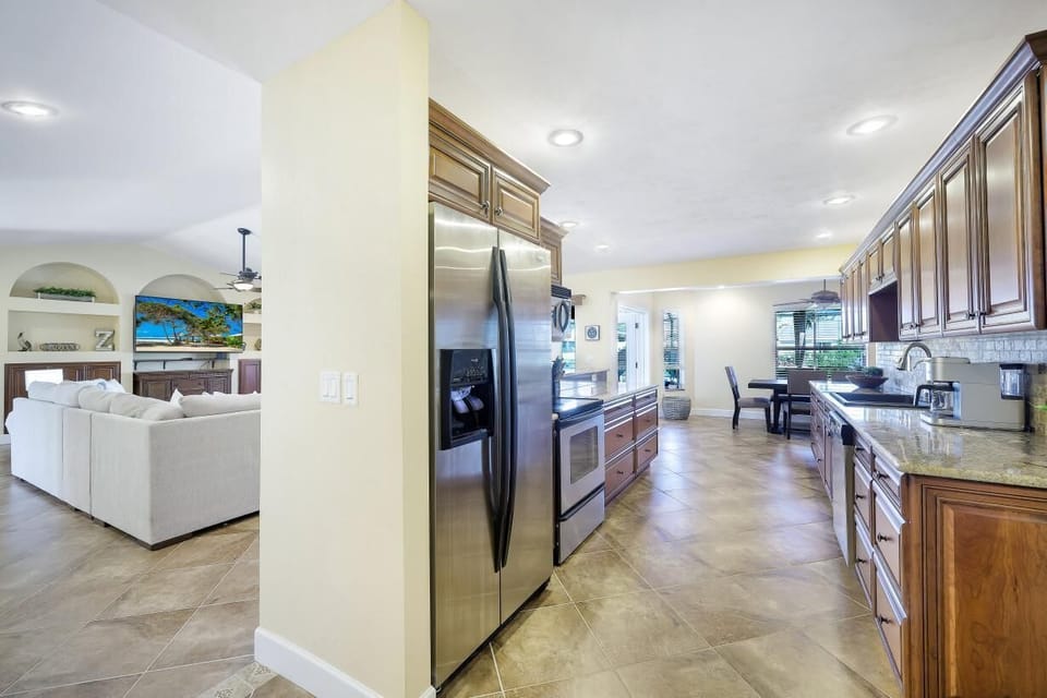 View of the Kitchen overlooking the Living area