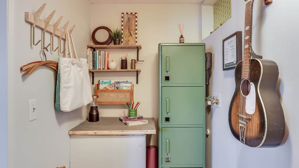 Cute open space is great to store your bulky items and/or dress with privacy.