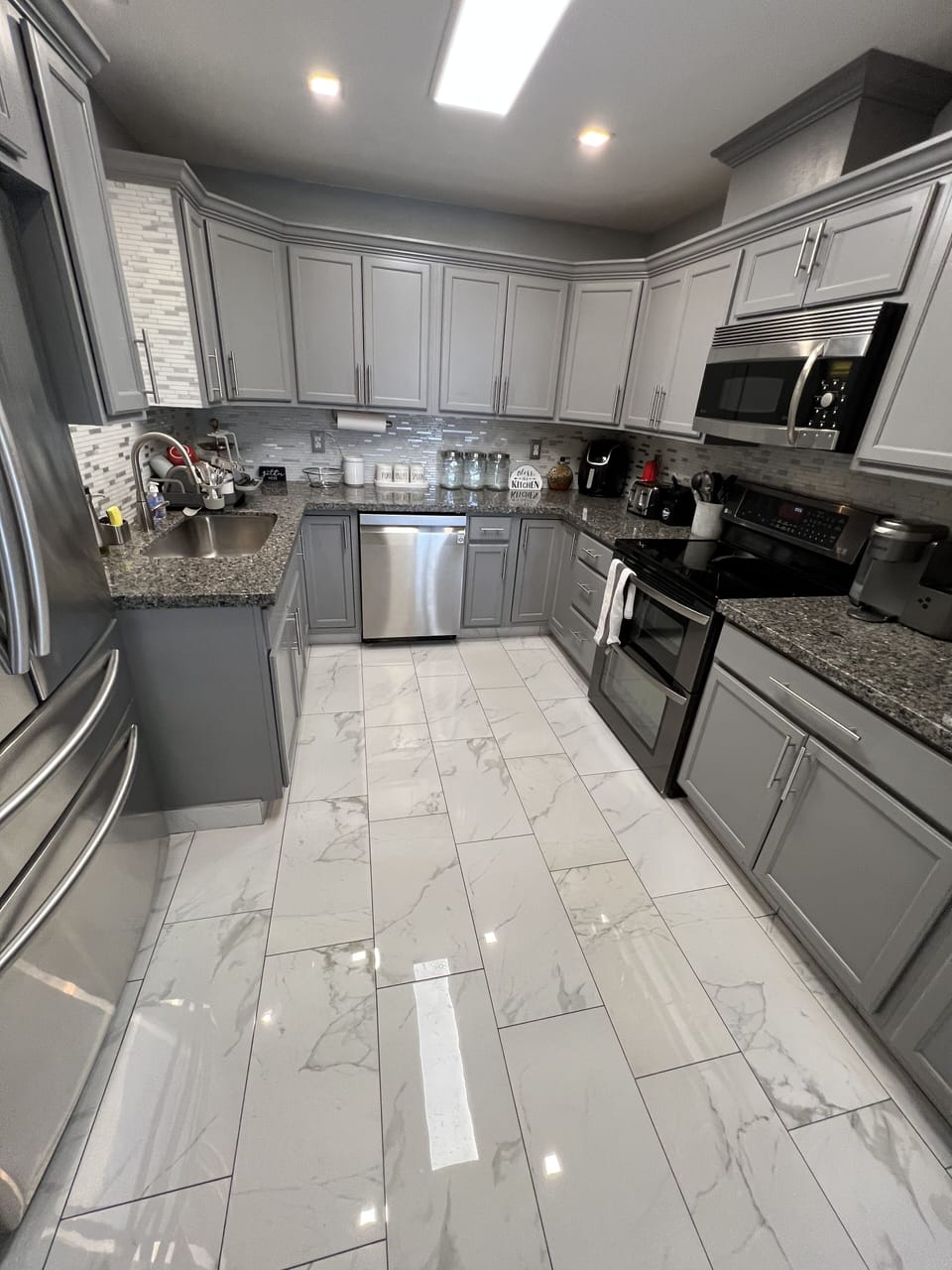 Marble flooring / granite countertops/ stainless steel appliances 