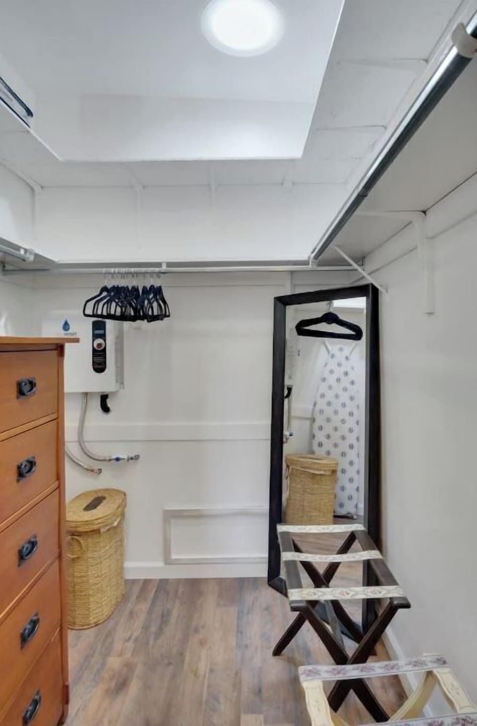 In the closets of every room are extra blankets and pillows.