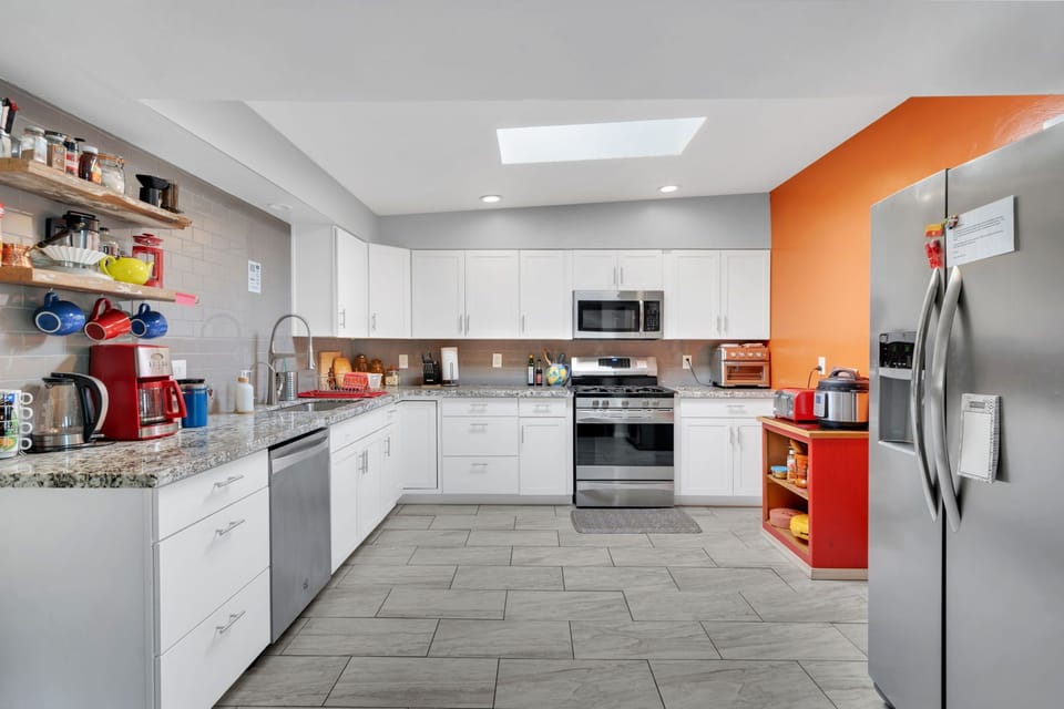 A  massive kitchen, with plenty of space and plenty of amenities to cook with!