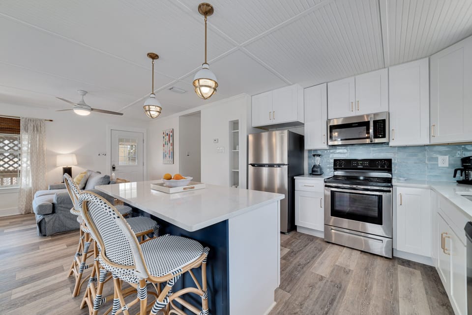 Kitchen with island bar seating for 3
