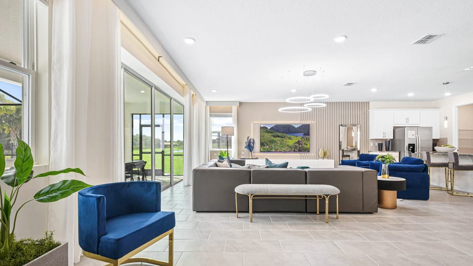 Sleek living space with scenic views, modern furnishings, and seamless indoor-outdoor flow.