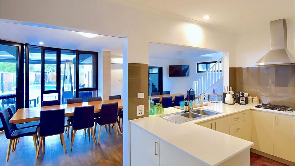 Open kitchen with large breakfast bench.