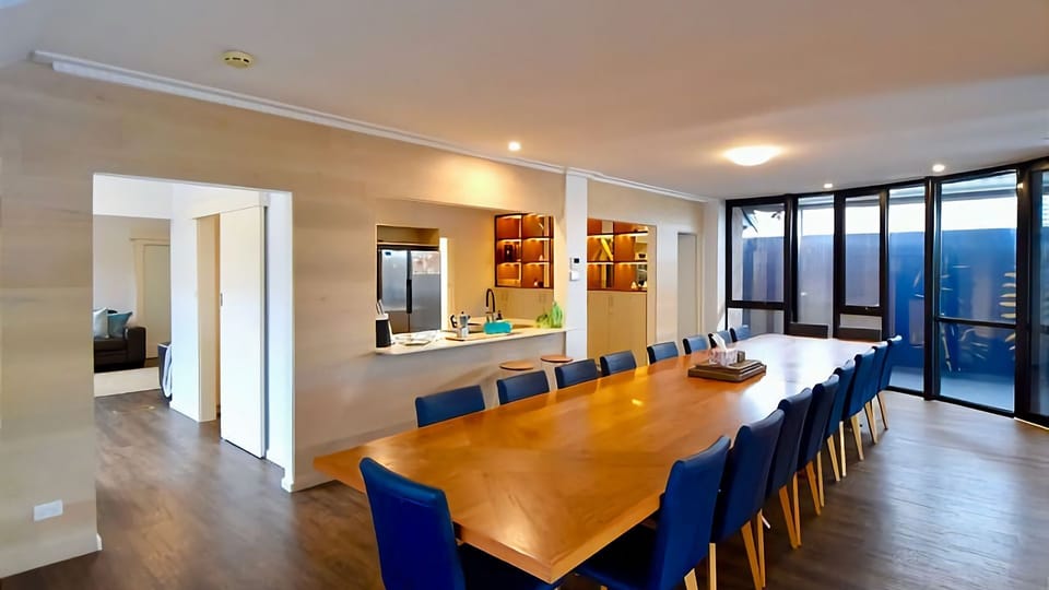 Large dining area that accommodates 18 people.