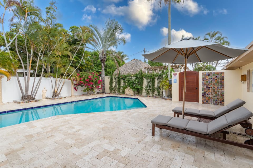 Heated Saltwater Pool, Behind that wooden door is backyard to Unit B