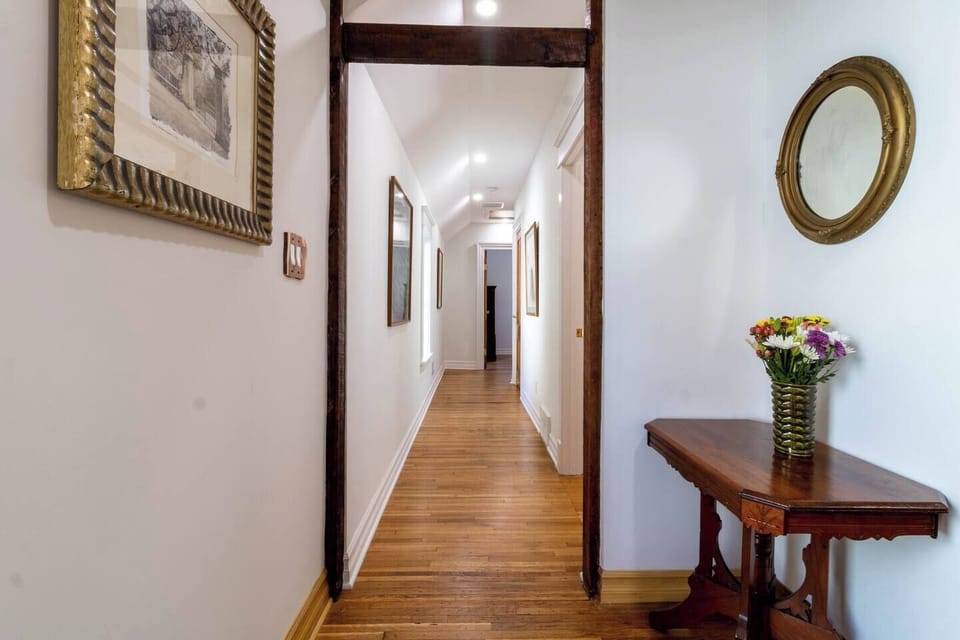 Quiet bedroom area; this hallway creates a perfect quiet sleeping space separated from the kitchen and living area!