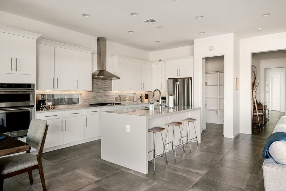 Bright, inviting eat in kitchen designed for making connections.