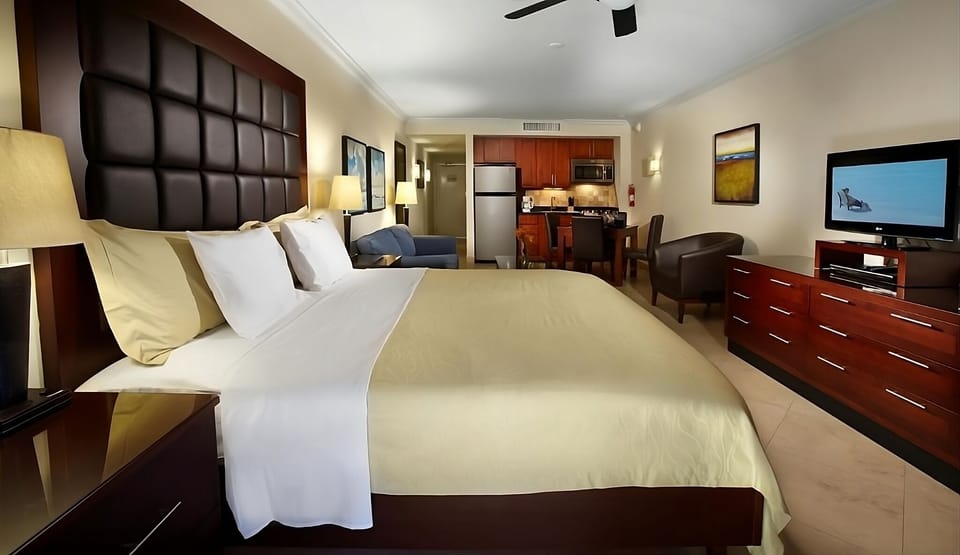 Recharge in crisp linens with the kitchen just steps away.