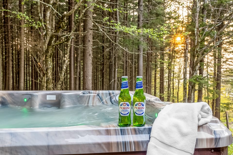 Relax and rejuvenate in our private hot tub while enjoying the sunset