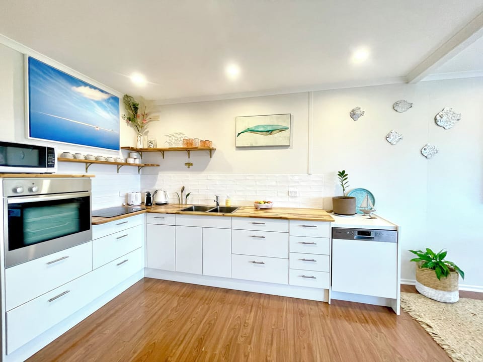 Fully Equipped Kitchen with Dishwasher and Full-Size Fridge