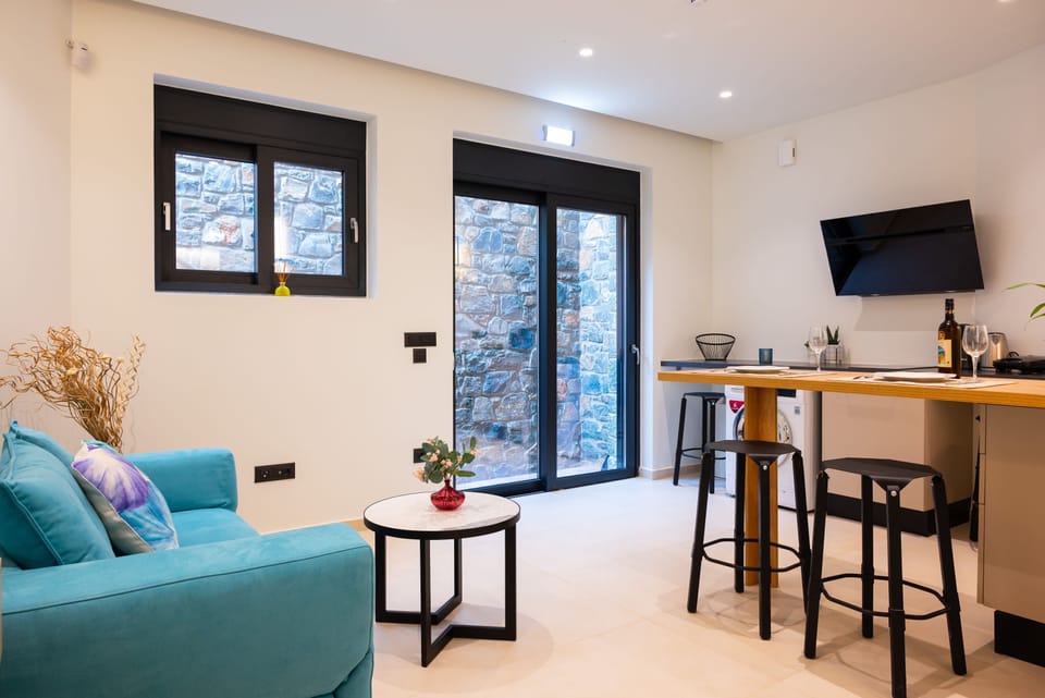 The lower floor is an independent area within the villa, accessible through its own private entrance, via an external staircase.