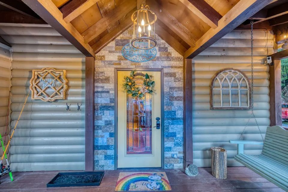 Relax on the front porch swing while you watch kids hauling in the groceries!