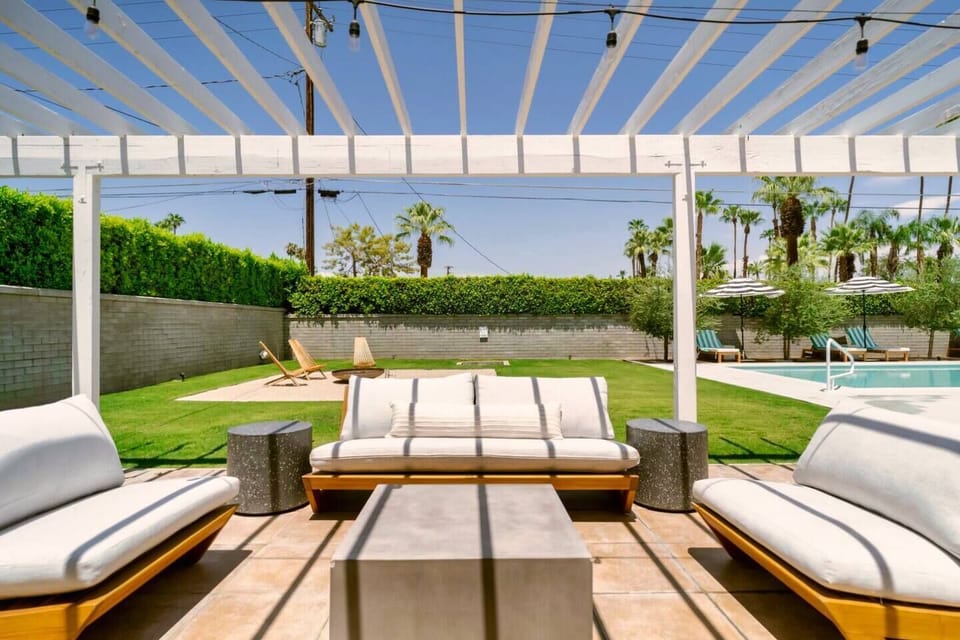 Outdoor living room just off the double sliding doors in the primary bedroom.