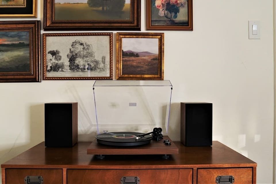 Experience the pristine sound of our modern record player.