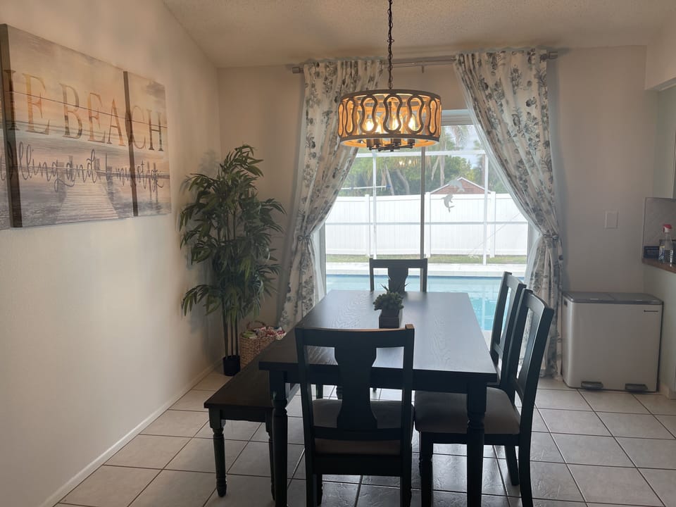 Dining Area leads out to the pool