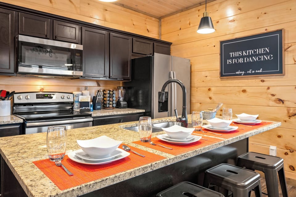 Kitchen island has seating for four.