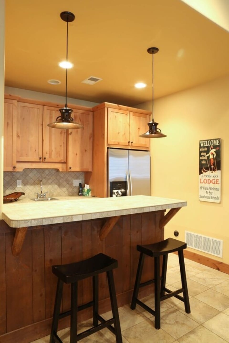 Basement bar area.  Sauna is just to the right of this picture.
