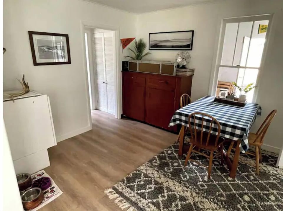 Small dining room area. Table has built in wings to seat up to 6.