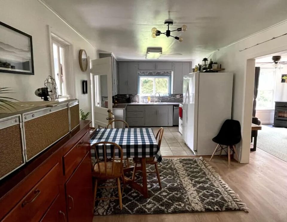 Small dining room area. Table has built in wings to seat up to 6.