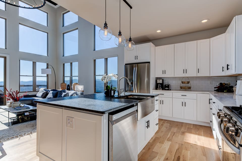 Open concept kitchen, living, and dining rooms