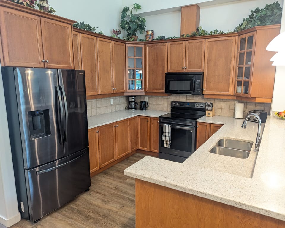 Also includes a coffee maker, kettle, and toaster.