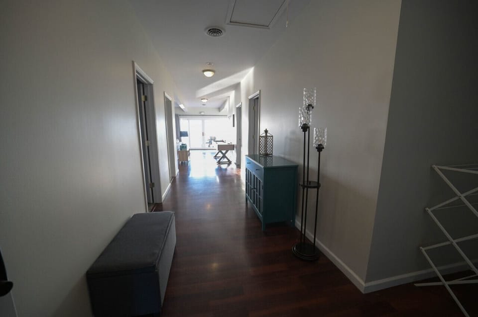 A long, inviting hallway bathed in warm sunlight