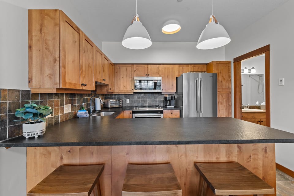 Counter seating and new updated light fixtures w/dimmers