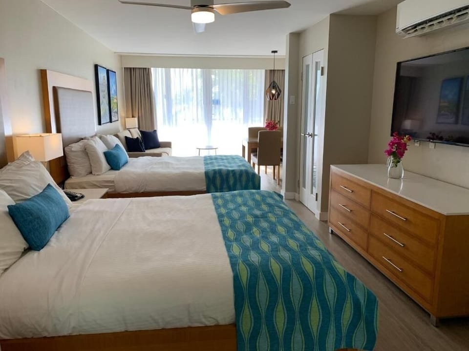 Unwind with a movie on the big TV from bed.