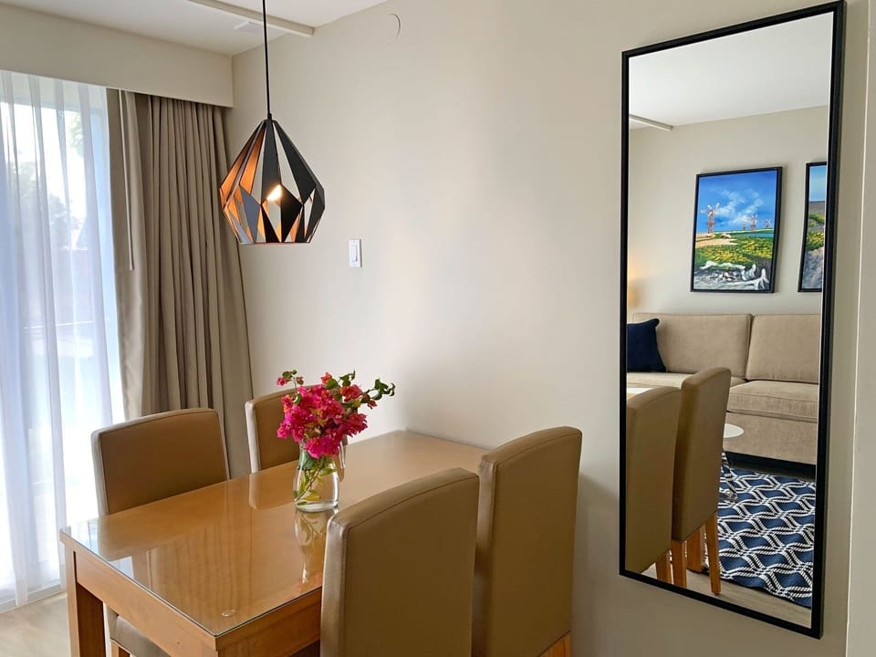 Gather for easy meals at your sunny, comfortable dining table.