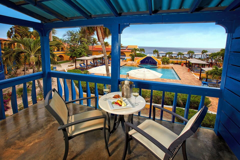 Sip chilled wine as ocean breezes overlook the sparkling pool.