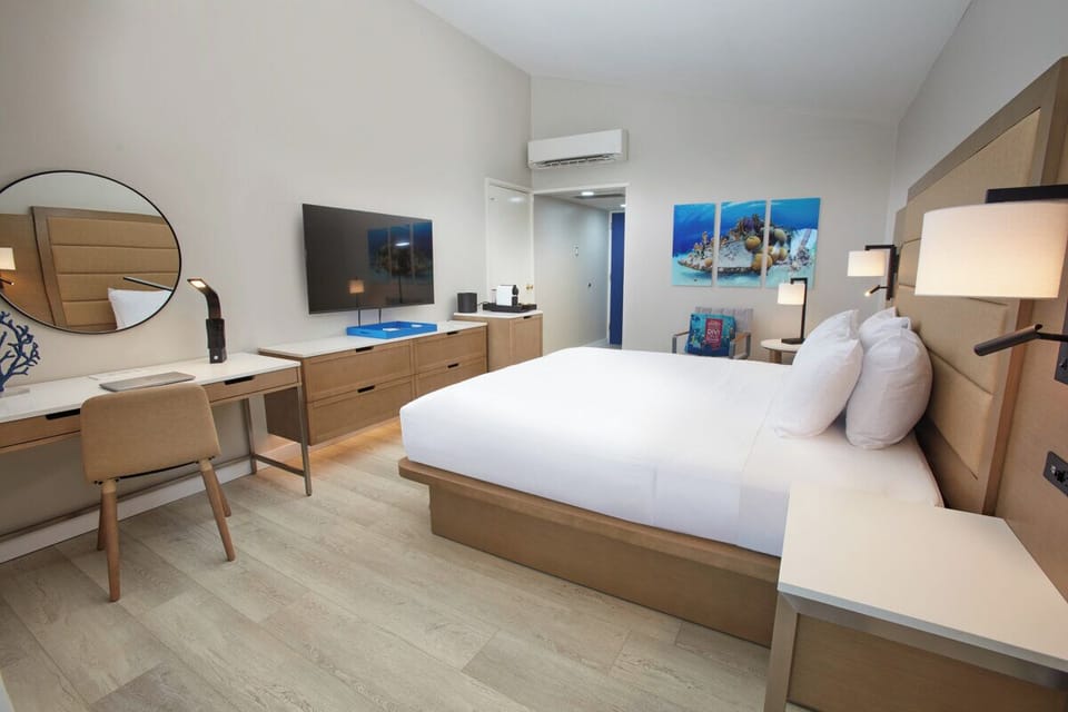 Settle in with a dedicated workspace and airy, modern comforts.