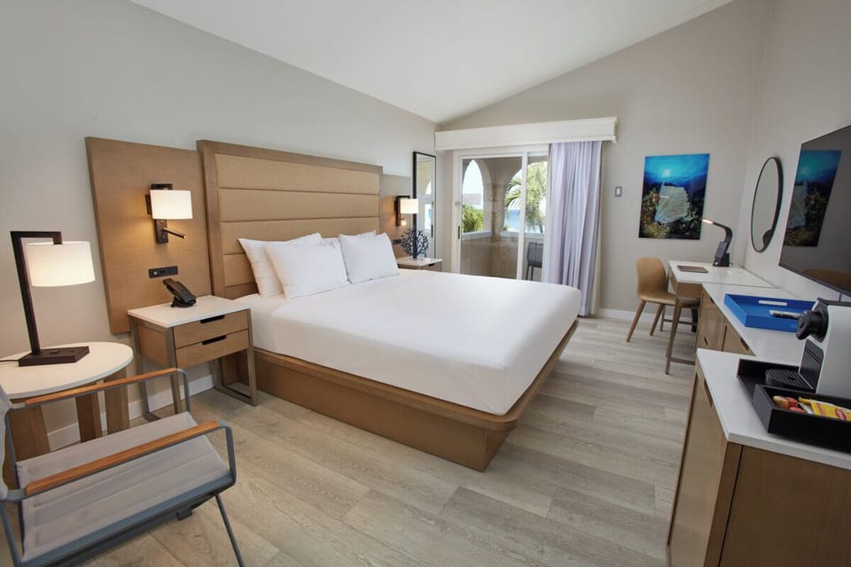 Step from your king bed straight onto the breezy balcony.