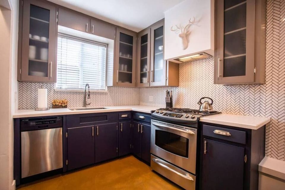 Updated kitchen with modern appliances and plenty of counter space.
