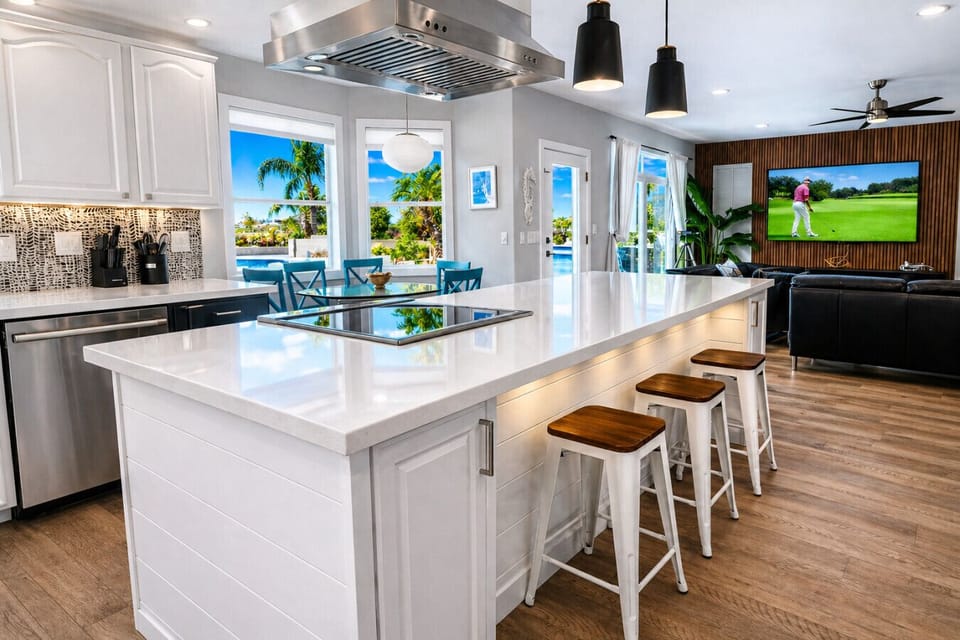 Bar chairs in kitchen island, stainless appliances!  Kitchen bar eating